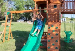 Boy going down the slide