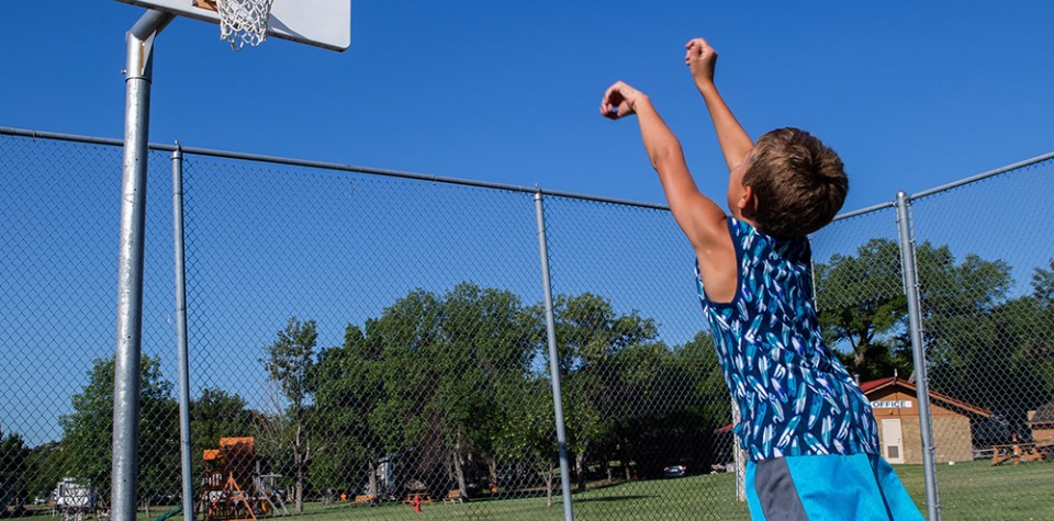 Boy playing basketball