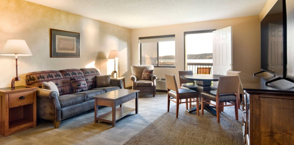Sofa and Chair in room with deck