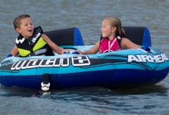 Kids on a tube in the water