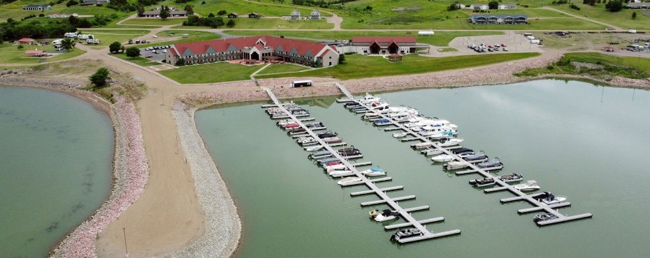 Kids jumping off a pontoon into the water